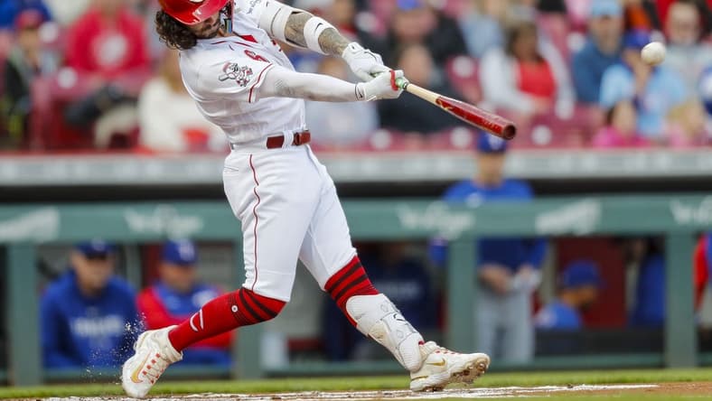Apr 24, 2023; Cincinnati, Ohio, USA; Cincinnati Reds second baseman Jonathan India (6) hits a double against the Texas Rangers in the first inning at Great American Ball Park. Mandatory Credit: Katie Stratman-USA TODAY Sports