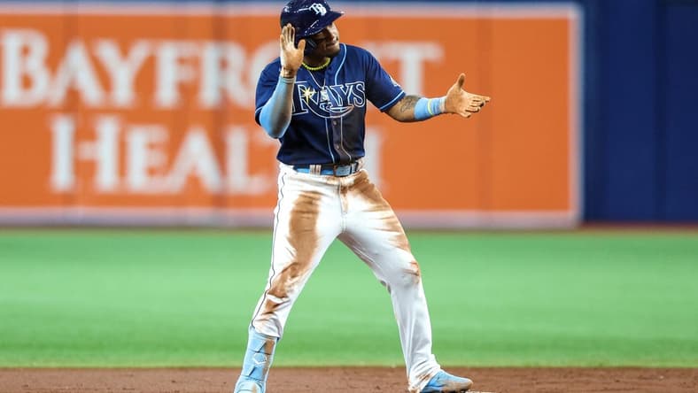 Apr 24, 2023; St. Petersburg, Florida, USA;  Tampa Bay Rays shortstop Wander Franco (5) reacts after hitting a double against the Houston Astros in the second inning at Tropicana Field. Mandatory Credit: Nathan Ray Seebeck-USA TODAY Sports