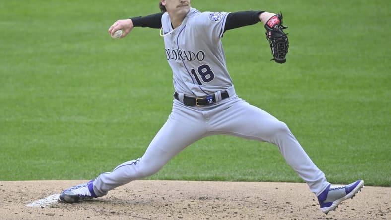 Apr 25, 2023; Cleveland, Ohio, USA; Colorado Rockies starting pitcher Ryan Feltner (18) delivers during the first inning against the Cleveland Guardians at Progressive Field. Mandatory Credit: David Richard-USA TODAY Sports