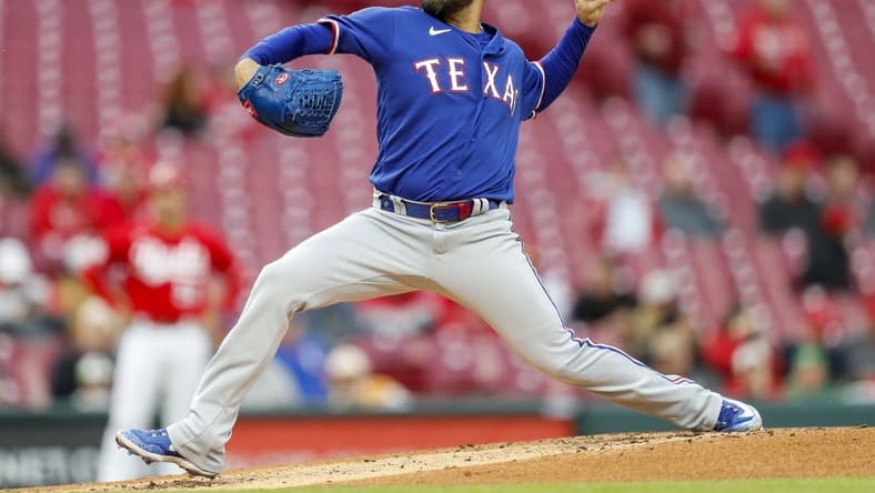 Apr 25, 2023; Cincinnati, Ohio, USA; Texas Rangers starting pitcher Martin Perez (54) pitches against the Cincinnati Reds in the first inning at Great American Ball Park. Mandatory Credit: Katie Stratman-USA TODAY Sports