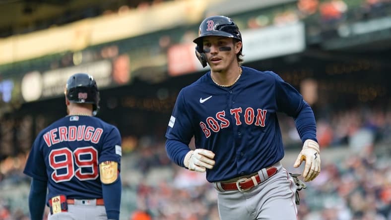 Apr 25, 2023; Baltimore, Maryland, USA; Boston Red Sox center fielder Jarren Duran (16) runs to the dugout after scoring during the second inning against the Baltimore Orioles  at Oriole Park at Camden Yards. Mandatory Credit: Tommy Gilligan-USA TODAY Sports