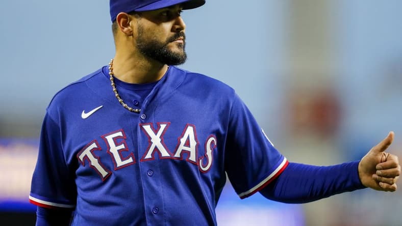 Apr 25, 2023; Cincinnati, Ohio, USA; Texas Rangers starting pitcher Martin Perez (54) walks off the field at the end of the sixth inning in the game against the Cincinnati Reds at Great American Ball Park. Mandatory Credit: Katie Stratman-USA TODAY Sports