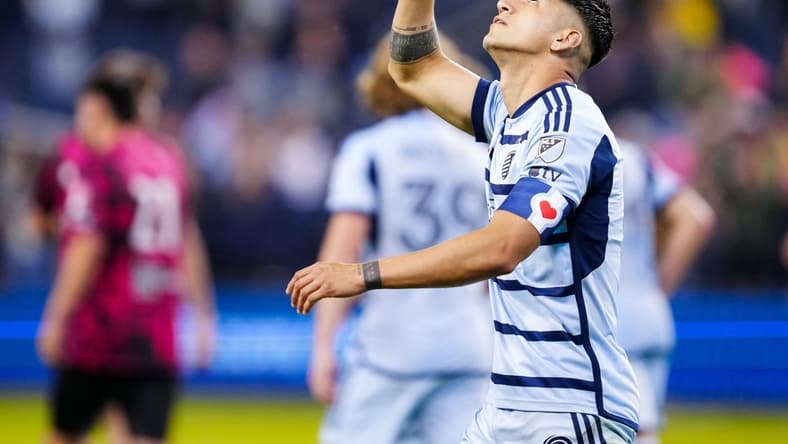 Apr 25, 2023; Kansas City, KS, USA; Sporting Kansas City forward Alan Pulido (9) celebrates after scoring a goal during the second half against Tulsa Athletic at Children's Mercy Park. Mandatory Credit: Jay Biggerstaff-USA TODAY Sports