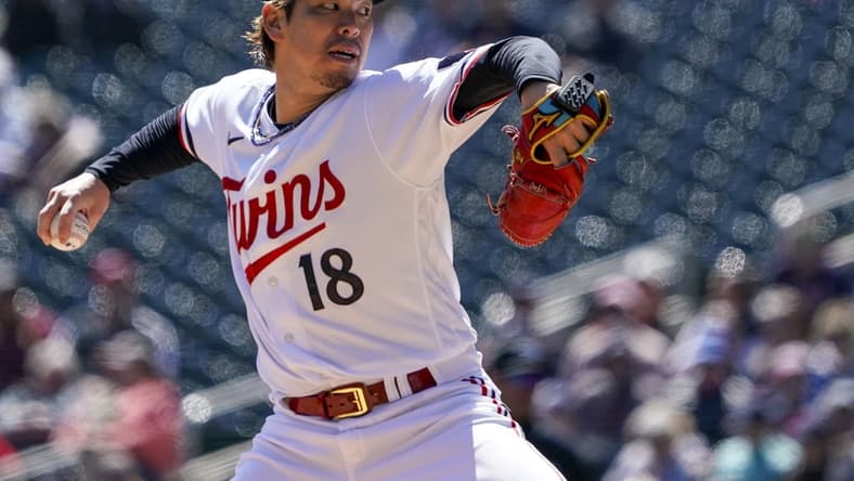 Apr 26, 2023; Minneapolis, Minnesota, USA; Minnesota Twins pitcher Kenta Maeda (18) delivers a pitch against the New York Yankees at Target Field. Mandatory Credit: Nick Wosika-USA TODAY Sports