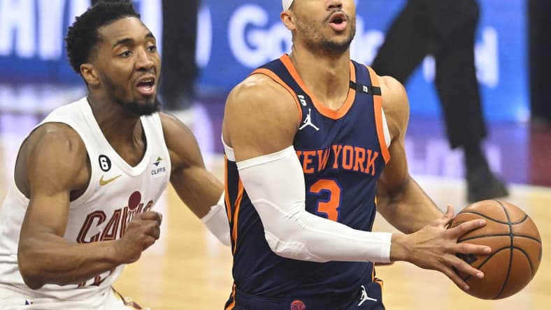 Apr 26, 2023; Cleveland, Ohio, USA; New York Knicks guard Josh Hart (3) drives beside Cleveland Cavaliers guard Donovan Mitchell (45) in the first quarter during game five of the 2023 NBA playoffs at Rocket Mortgage FieldHouse. Mandatory Credit: David Richard-USA TODAY Sports