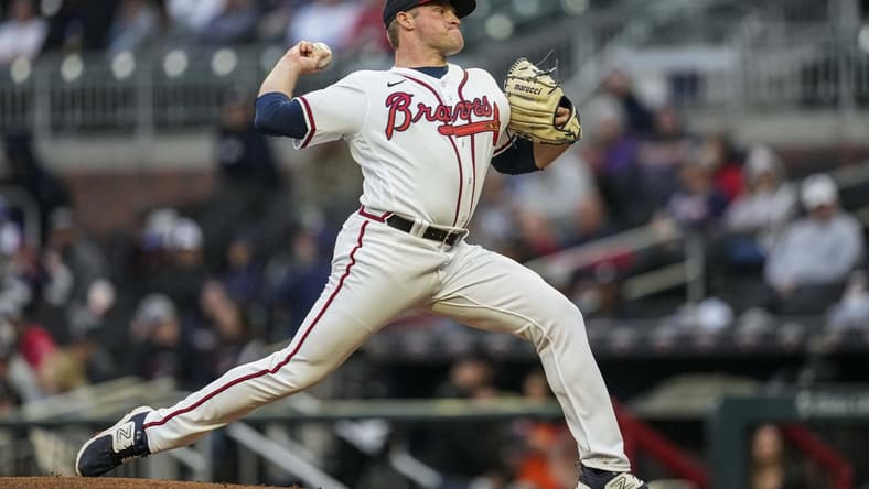 Apr 26, 2023; Cumberland, Georgia, USA; Atlanta Braves starting pitcher Bryce Elder (55) pitches against the Miami Marlins during the second inning at Truist Park. Mandatory Credit: Dale Zanine-USA TODAY Sports