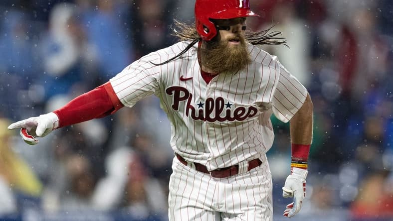 Apr 26, 2023; Philadelphia, Pennsylvania, USA; Philadelphia Phillies center fielder Brandon Marsh (16) reacts after hitting a single against the Seattle Mariners during the eighth inning at Citizens Bank Park. Mandatory Credit: Bill Streicher-USA TODAY Sports