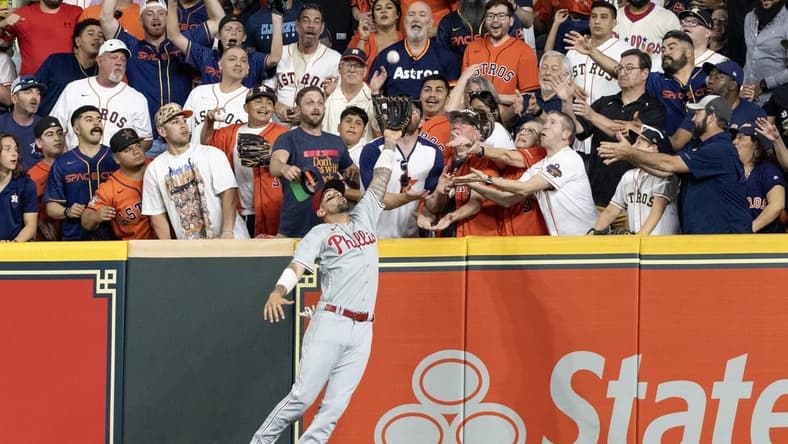 Apr 28, 2023; Houston, Texas, USA; Philadelphia Phillies right fielder Nick Castellanos (8) catches Houston Astros third baseman Alex Bregman (2) (not pictured) fly ball for an out in the first inning at Minute Maid Park. Mandatory Credit: Thomas Shea-USA TODAY Sports
