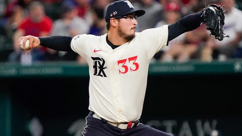 Apr 28, 2023; Arlington, Texas, USA; Texas Rangers relief pitcher Dane Dunning (33) throws to the plate during the fifth inning against the New York Yankees at Globe Life Field. Mandatory Credit: Raymond Carlin III-USA TODAY Sports