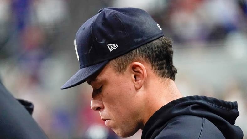Apr 28, 2023; Arlington, Texas, USA; New York Yankees center fielder Aaron Judge (99) sits in the dugout during during the eighth inning against the Texas Rangers at Globe Life Field. Mandatory Credit: Raymond Carlin III-USA TODAY Sports