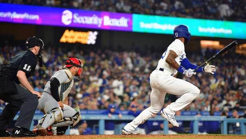 Apr 28, 2023; Los Angeles, California, USA; Los Angeles Dodgers right fielder Jason Heyward (23) hits an RBI double against the St. Louis Cardinals during the third inning at Dodger Stadium. Mandatory Credit: Gary A. Vasquez-USA TODAY Sports