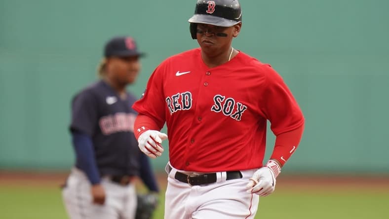 Apr 29, 2023; Boston, Massachusetts, USA; Boston Red Sox third baseman Rafael Devers (11) rounds the bases after hitting a three run home run against the Cleveland Guardians in the first inning at Fenway Park. Mandatory Credit: David Butler II-USA TODAY Sports