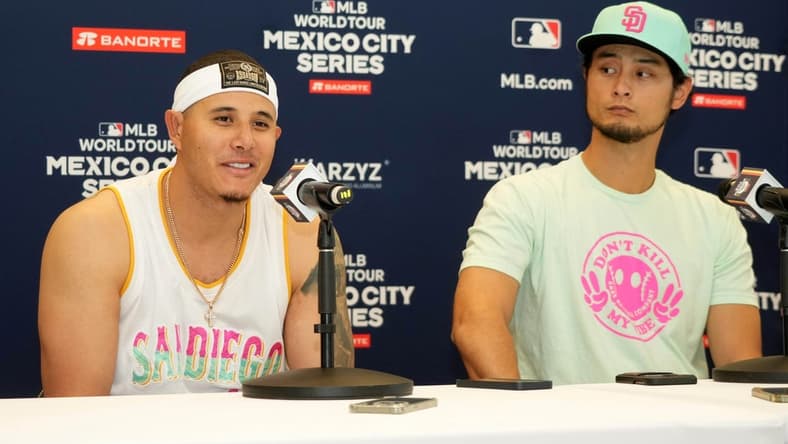 Apr 29, 2023; Mexico City, Mexico; San Diego Padres third baseman Manny Machado (left) and pitcher Yu Darvish at a press conference during a MLB World Tour game at Estadio Alfredo Harp Helu. Mandatory Credit: Kirby Lee-USA TODAY Sports
