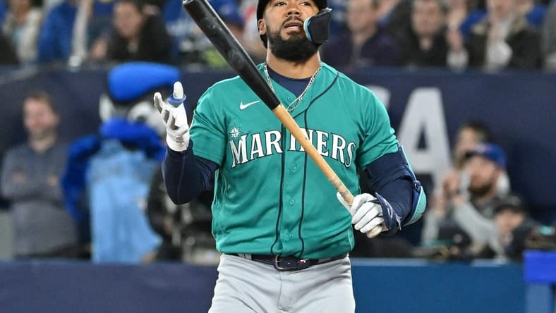 Apr 29, 2023; Toronto, Ontario, CAN; Seattle Mariners right fielder Teoscar Hernandez (35) reacts after striking out for the fourth time against the Toronto Blue Jays in the ninth inning at Rogers Centre. Mandatory Credit: Dan Hamilton-USA TODAY Sports