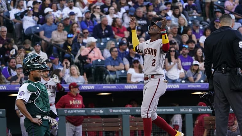 Apr 29, 2023; Denver, Colorado, USA;  Arizona Diamondbacks shortstop Geraldo Perdomo (2) crosses the plat after his three-run homer in the second inning at Coors Field. Mandatory Credit: Michael Madrid-USA TODAY Sports