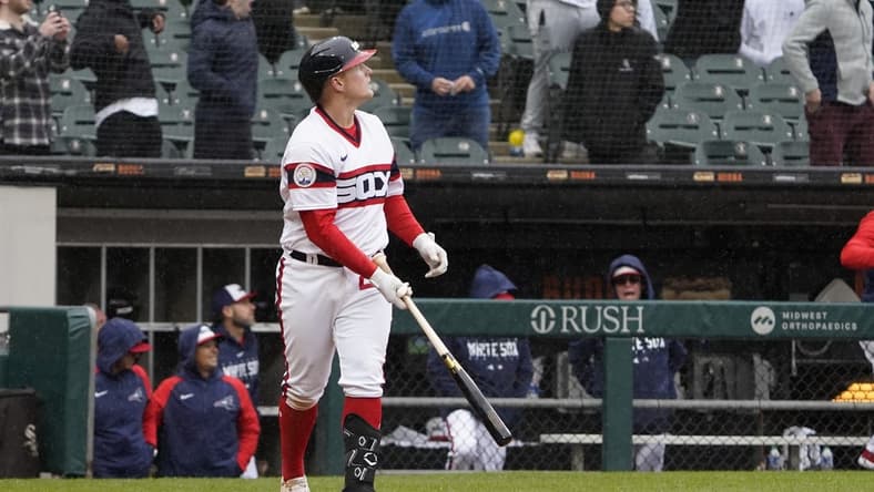 Apr 30, 2023; Chicago, Illinois, USA; Chicago White Sox first baseman Andrew Vaughn (25) watches his game-winning three-run home run against the Tampa Bay Rays during the ninth inning at Guaranteed Rate Field. Mandatory Credit: David Banks-USA TODAY Sports