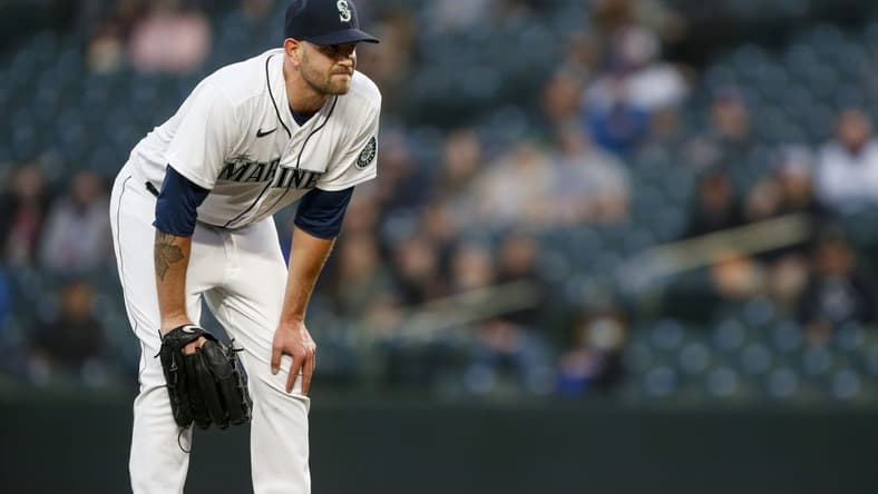 Apr 6, 2021; Seattle, Washington, USA; Seattle Mariners starting pitcher James Paxton (44) reacts following an injury during the second inning against the Chicago White Sox at T-Mobile Park. Mandatory Credit: Joe Nicholson-USA TODAY Sports
