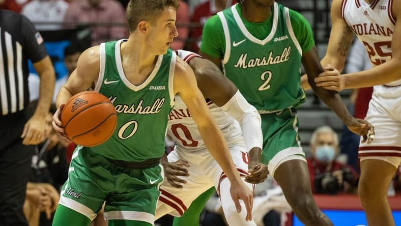 Nov 27, 2021; Bloomington, Indiana, USA; Marshall Thundering Herd guard Andrew Taylor (0) dribbles the ball in the first half against the Indiana Hoosiers at Simon Skjodt Assembly Hall. Mandatory Credit: Trevor Ruszkowski-USA TODAY Sports