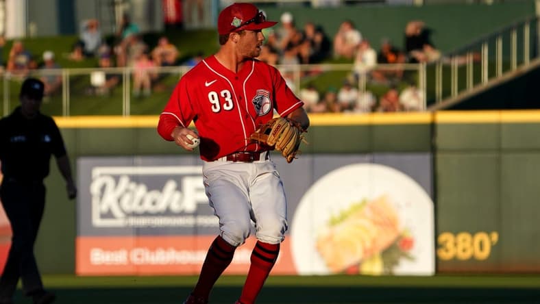 Cincinnati Reds shortstop Matt McLain (93) throws to first for an out during a spring training game against the Milwaukee Brewers, Wednesday, March 23, 2022, at Goodyear Ballpark in Goodyear, Ariz.
Cincinnati Reds Spring Training March 23 1658