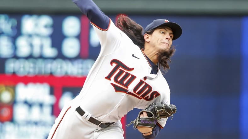 Apr 13, 2022; Minneapolis, Minnesota, USA; Minnesota Twins relief pitcher Dereck Rodriguez (32) throws to the Los Angeles Dodgers in the eighth inning at Target Field. Mandatory Credit: Bruce Kluckhohn-USA TODAY Sports