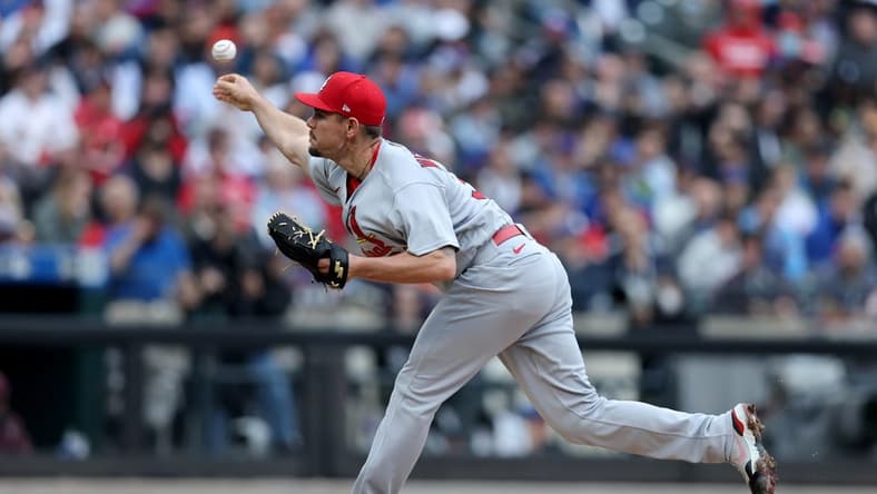 May 19, 2022; New York City, New York, USA; St. Louis Cardinals relief pitcher Nick Wittgren (30) pitches against the New York Mets during the fifth inning at Citi Field. Mandatory Credit: Brad Penner-USA TODAY Sports