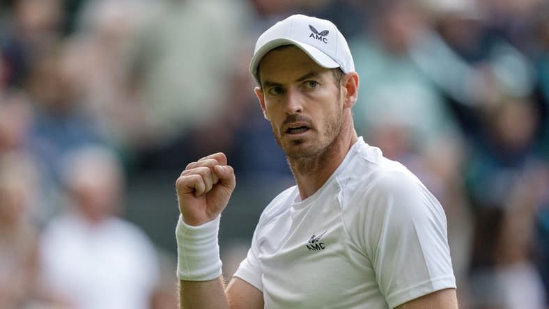 Jun 29, 2022; London, United Kingdom; Andy Murray (GBR) reacts to a point during his second round match against John Isner (USA) on day three at All England Lawn Tennis and Croquet Club. Mandatory Credit: Susan Mullane-USA TODAY Sports