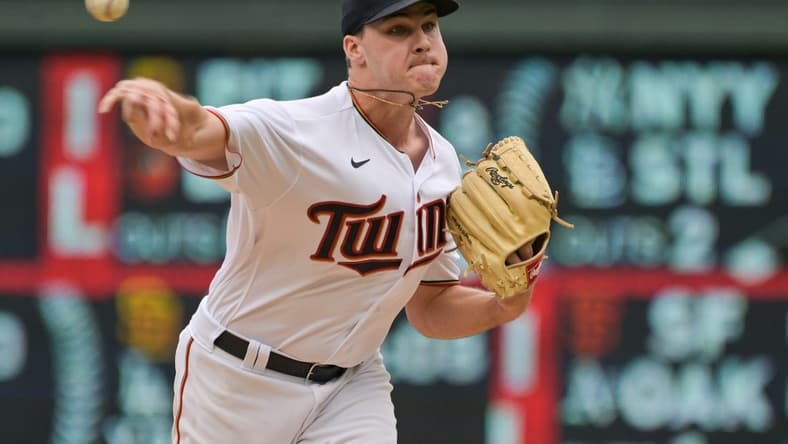 Aug 7, 2022; Minneapolis, Minnesota, USA; Minnesota Twins starting pitcher Cole Sands (77) throws a pitch against the Toronto Blue Jays during the sixth inning at Target Field. Mandatory Credit: Jeffrey Becker-USA TODAY Sports