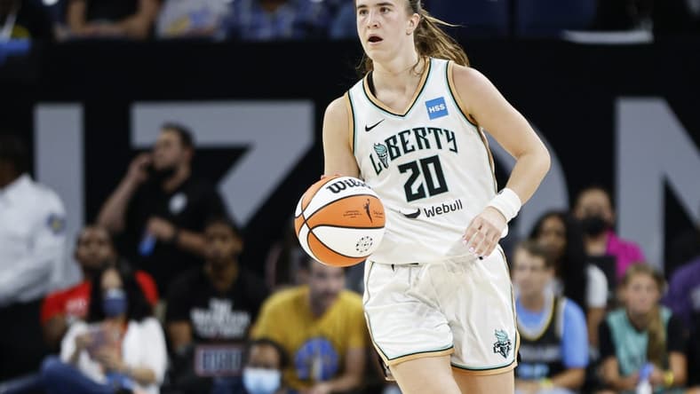 Aug 17, 2022; Chicago, Illinois, USA; New York Liberty guard Sabrina Ionescu (20) brings the ball up court against the Chicago Sky during the second half of game one of the first round of the WNBA playoffs at Wintrust Arena. Mandatory Credit: Kamil Krzaczynski-USA TODAY Sports