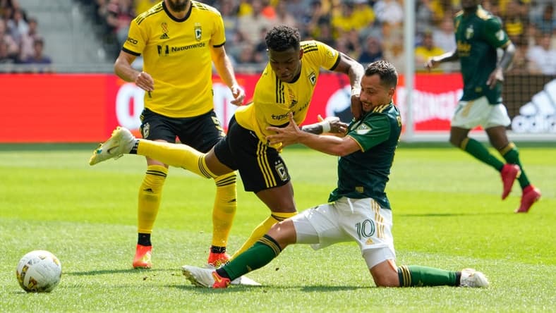Sep 18, 2022; Columbus, Ohio, USA; Columbus Crew midfielder Luis Diaz (12) fights for a ball with Portland Timbers midfielder Sebastian Blanco (10) during the second half of the MLS game at Lower.com Field. The Crew and Timbers tied 1-1. Mandatory Credit: Adam Cairns-The Columbus Dispatch

Mls Portland Timbers At Columbus Crew