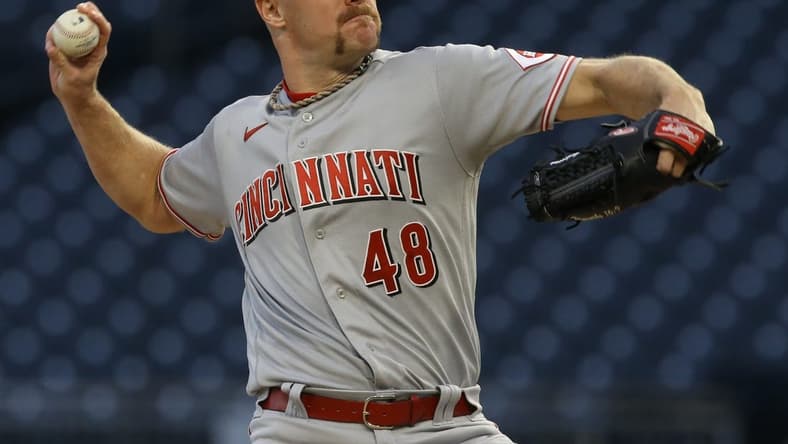 Sep 26, 2022; Pittsburgh, Pennsylvania, USA; Cincinnati Reds starting pitcher Chase Anderson (48) throws a pitch against the Pittsburgh Pirates during the first inning at PNC Park. Mandatory Credit: Charles LeClaire-USA TODAY Sports
