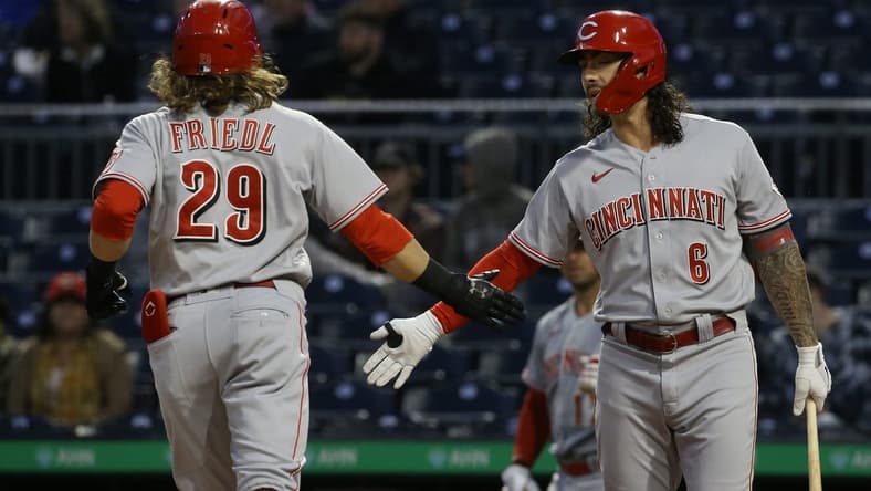 Sep 26, 2022; Pittsburgh, Pennsylvania, USA; Cincinnati Reds second baseman Jonathan India (6) congratulates left fielder TJ Friedl (29) on his solo home run against the Pittsburgh Pirates during the third inning at PNC Park. Mandatory Credit: Charles LeClaire-USA TODAY Sports