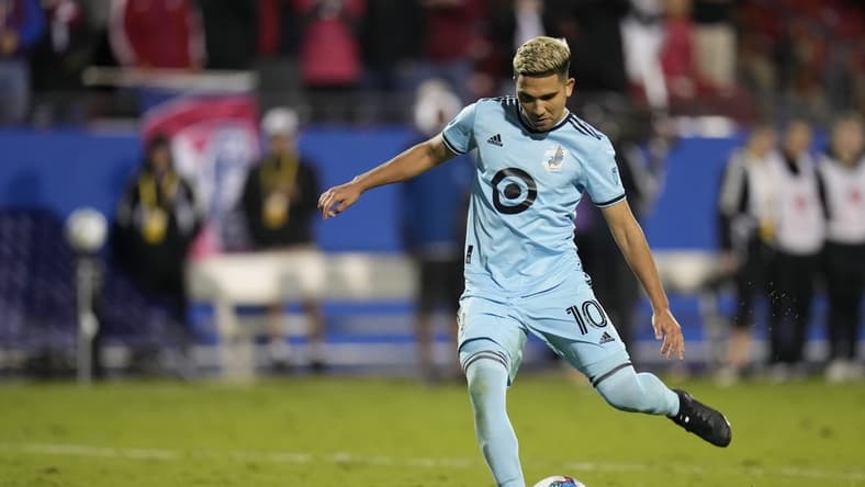 Oct 17, 2022; Frisco, Texas, US; Minnesota United midfielder Emanuel Reynoso (10) takes a penalty kick during the penalty shootout against the FC Dallas at Toyota Stadium. Mandatory Credit: Chris Jones-USA TODAY Sports