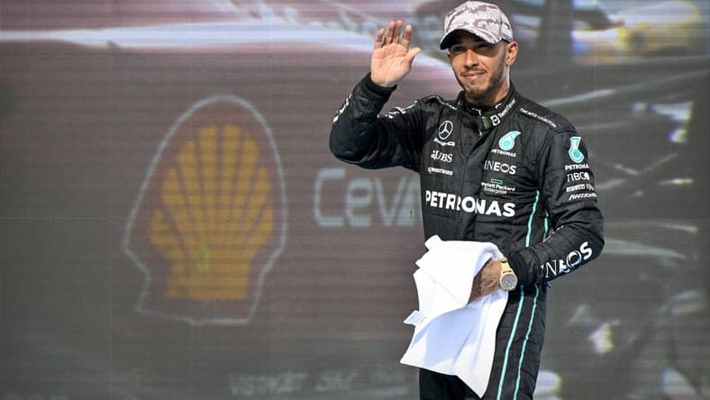Oct 23, 2022; Austin, Texas, USA; Mercedes AMG Petronas Motorsport driver Lewis Hamilton (44) of Team Great Britain waves to the fans after the U.S. Grand Prix F1 race at Circuit of the Americas. Mandatory Credit: Jerome Miron-USA TODAY Sports