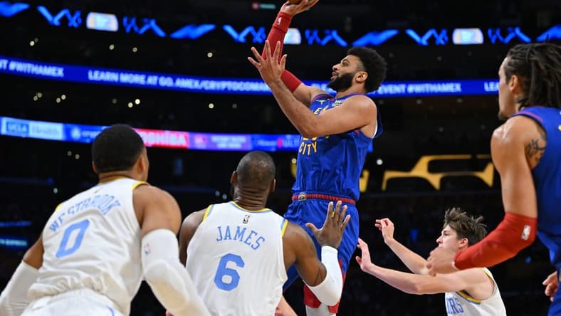 Oct 30, 2022; Los Angeles, California, USA; Denver Nuggets guard Jamal Murray (27) goes up for a basket as Los Angeles Lakers guard Russell Westbrook (0) and forward LeBron James (6) look on in the first half at Crypto.com Arena. Mandatory Credit: Jayne Kamin-Oncea-USA TODAY Sports