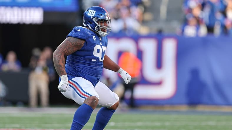 Jan 1, 2023; East Rutherford, New Jersey, USA; New York Giants defensive tackle Dexter Lawrence (97) celebrates a defensive stop during the second half against the Indianapolis Colts at MetLife Stadium. Mandatory Credit: Vincent Carchietta-USA TODAY Sports