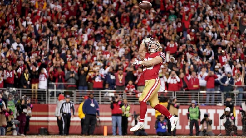 Jan 22, 2023; Santa Clara, California, USA; San Francisco 49ers running back Christian McCaffrey (23) celebrates after scoring a touchdown during the fourth quarter of a NFC divisional round game against the Dallas Cowboys at Levi's Stadium. Mandatory Credit: Kyle Terada-USA TODAY Sports