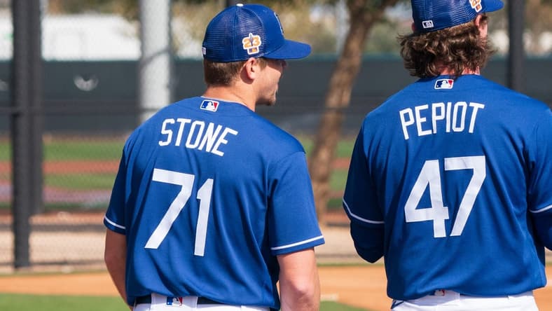 Feb 18, 2023; Glendale, AZ, USA; Los Angeles Dodgers pitchers Gavin Stone (71) and Ryan Pepiot (47) warm up during a spring training workout at Camelback Ranch. Mandatory Credit: Allan Henry-USA TODAY Sports