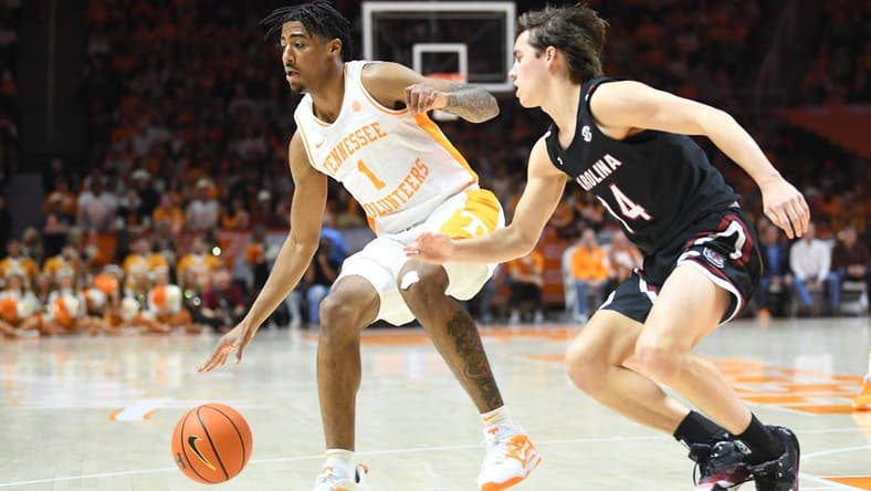 Tennessee guard B.J. Edwards (1) dribbles while defended by South Carolina guard Eli Sparkman (14) during an NCAA college basketball game between the South Carolina Game Cocks and the Tennessee Volunteers in Thompson-Boling Arena in Knoxville, Saturday Feb. 25, 2023.

Volssc0225 0944