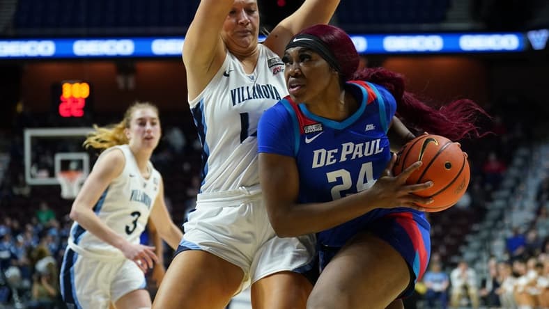 Mar 4, 2023; Uncasville, CT, USA; DePaul Blue Demons forward Aneesah Morrow (24) drives the ball against Villanova Wildcats forward Megan Olbrys (14) in the second half at Mohegan Sun Arena. Mandatory Credit: David Butler II-USA TODAY Sports