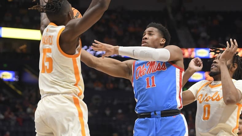 Mar 9, 2023; Nashville, TN, USA;  Tennessee Volunteers guard Jahmai Mashack (15) blocks the shot of Mississippi Rebels guard Matthew Murrell (11) during the first half at Bridgestone Arena. Mandatory Credit: Steve Roberts-USA TODAY Sports