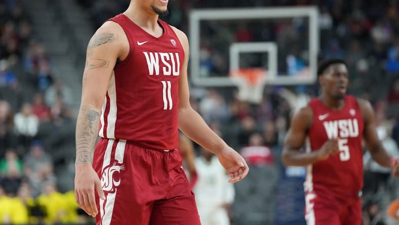 Mar 9, 2023; Las Vegas, NV, USA; Washington State Cougars forward DJ Rodman (11) celebrates after a scoring play against the Oregon Ducks during the first half at T-Mobile Arena. Mandatory Credit: Stephen R. Sylvanie-USA TODAY Sports