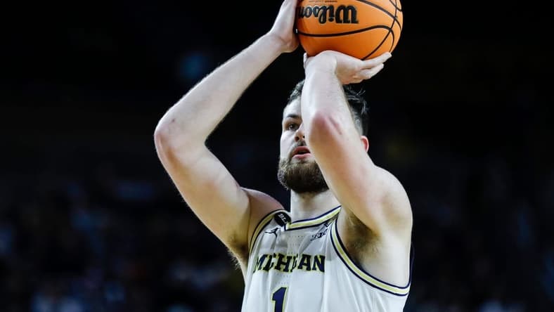 Michigan center Hunter Dickinson (1) attempts a free throw against Toledo during the second half of the first round of the NIT at Crisler Center in Ann Arbor on Tuesday, March 14, 2023.