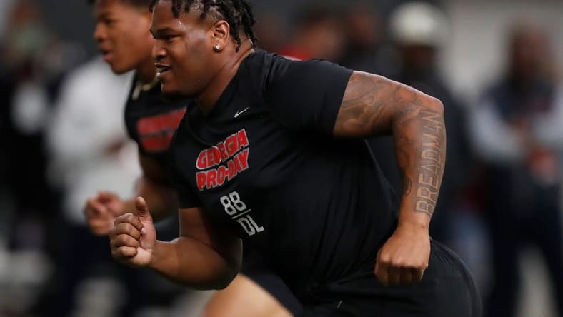 Georgia defensive lineman Jalen Carter (88) and Georgia linebacker Nolan Smith (4) run a drill during UGA Pro Day in Athens, Ga., on Wednesday, March 15, 2023.
News Joshua L Jones