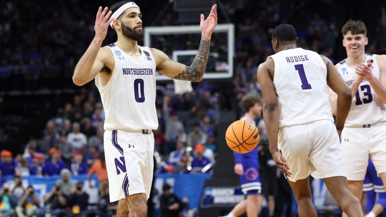 Mar 16, 2023; Sacramento, CA, USA; Northwestern Wildcats guard Boo Buie (0) celebrates after defeating the Boise State Broncos at Golden 1 Center. Mandatory Credit: Kelley L Cox-USA TODAY Sports