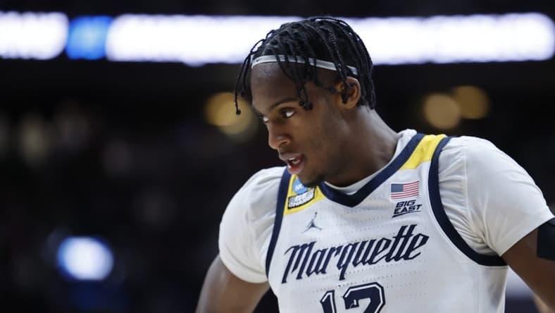 Mar 19, 2023; Columbus, OH, USA; Marquette Golden Eagles forward Olivier-Maxence Prosper (12) walks off the court after being defeated by the Michigan State Spartans at Nationwide Arena. Mandatory Credit: Rick Osentoski-USA TODAY Sports
