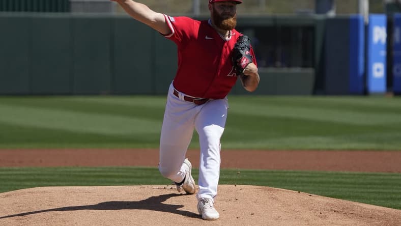 Mar 25, 2023; Tempe, Arizona, USA; Los Angeles Angels pitcher Sam Bachman (83) throws against the Chicago Cubs in the first inning at Tempe Diablo Stadium. Mandatory Credit: Rick Scuteri-USA TODAY Sports