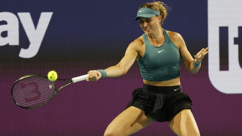 Mar 25, 2023; Miami, Florida, US; Paula Badosa (ESP) hits a forehand against Elena Rybakina (KAZ) (not pictured) on day six of the Miami Open at Hard Rock Stadium. Mandatory Credit: Geoff Burke-USA TODAY Sports