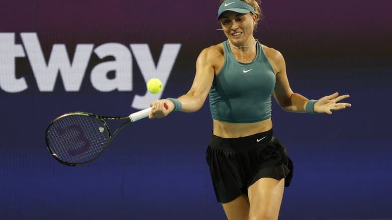 Mar 25, 2023; Miami, Florida, US; Paula Badosa (ESP) hits a forehand against Elena Rybakina (KAZ) (not pictured) on day six of the Miami Open at Hard Rock Stadium. Mandatory Credit: Geoff Burke-USA TODAY Sports