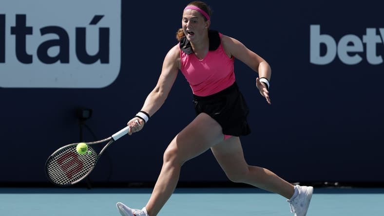 Mar 27, 2023; Miami, Florida, US; Jelena Ostapenko (LAT) hits a forehand against Martina Trevisan (ITA) (not pictured) on day eight of the Miami Open at Hard Rock Stadium. Mandatory Credit: Geoff Burke-USA TODAY Sports