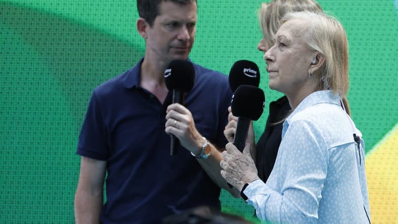 Mar 29, 2023; Miami, Florida, US; Martina Navratilova (R) does a tv hit for PrimeTV with co-presenters Tim Henman (L) and Daniela Hantuchova (M) during a stoppage between sets in the match between Sorana Cirstea (ROU) and Aryna Sabalenka (both not pictured) in a women's singles quarterfinal on day ten of the Miami Open at Hard Rock Stadium. Mandatory Credit: Geoff Burke-USA TODAY Sports